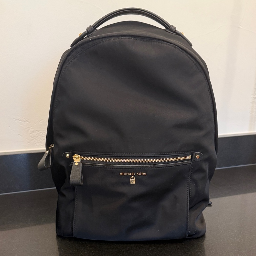 Michael Kors Women’s Black Backpack with Gold Accents